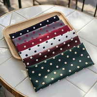Bandeau cheveux Polka Élan présenté en lot de six couleurs sur support studio.