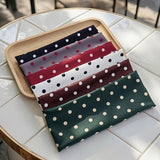Bandeau cheveux Polka Élan présenté en lot de six couleurs sur support studio.