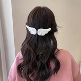 Barrette cheveux ailes d’ange blanches – style féminin vue arrière