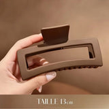 Pince cheveux PowerClip 13 marron mat finition premium présentée en gros plan.